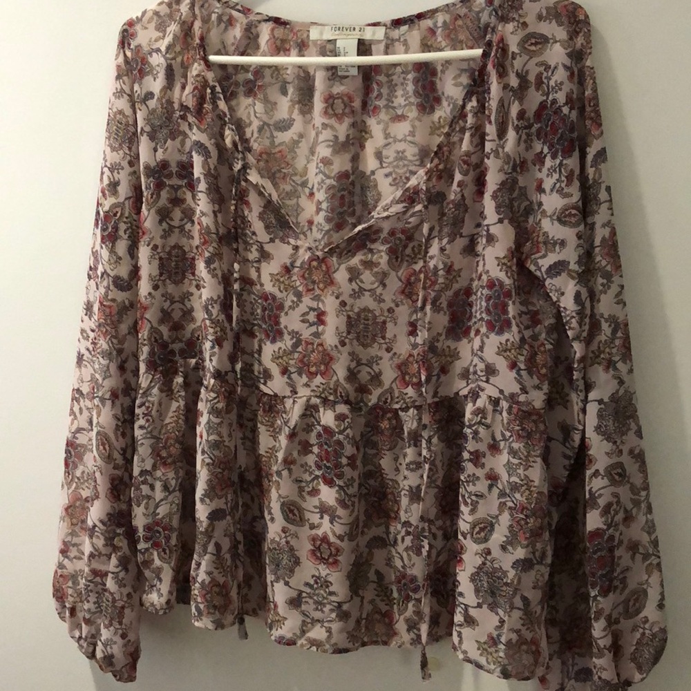 A sheer floral blouse